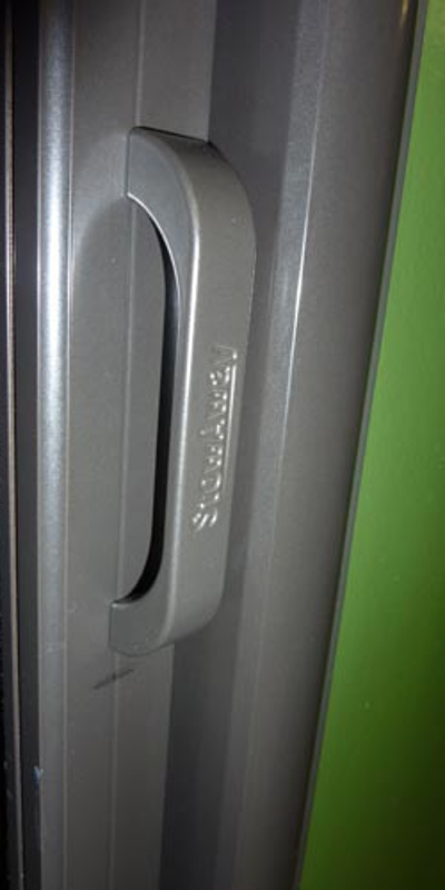 Die cast handles for retractable screen doors Photo